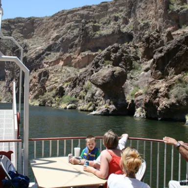 Guests enjoy a Dolly Steamboat cruise on Canyon Lake