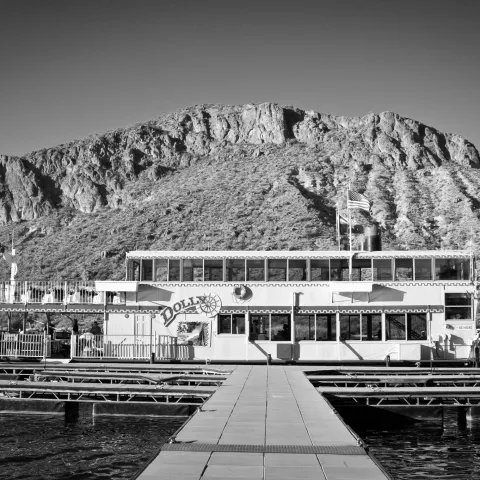 Dolly Steamboat at dock in black and white