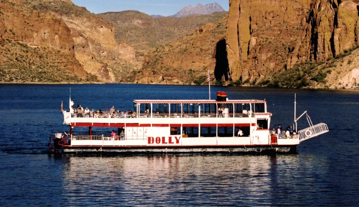dolly-steamboat-61 The Dolly on the water with the canyon scenery in the background